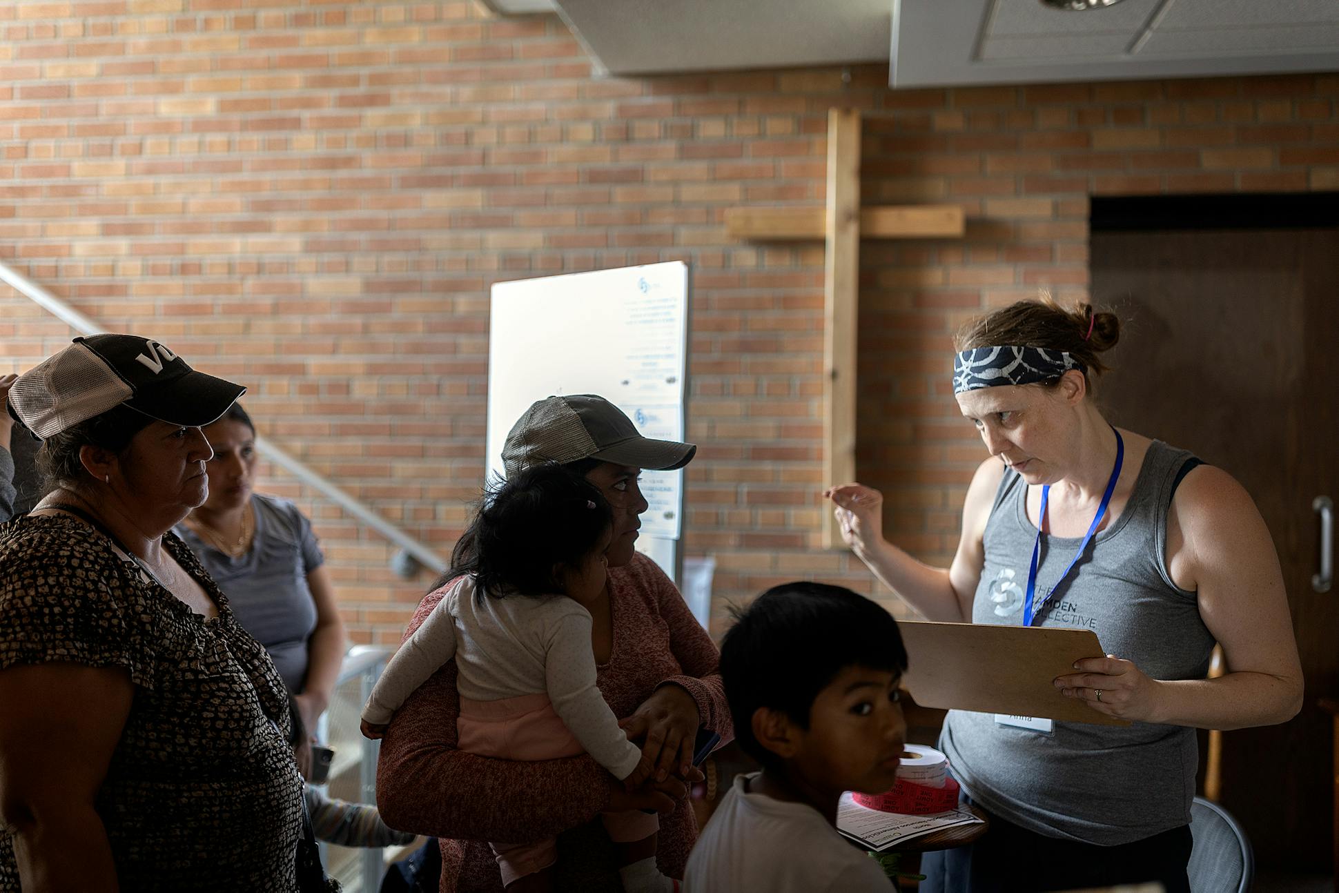 Anna directs people, mostly Ecuadorians, on how to get food from the food shelf that she runs in Minneapolis.