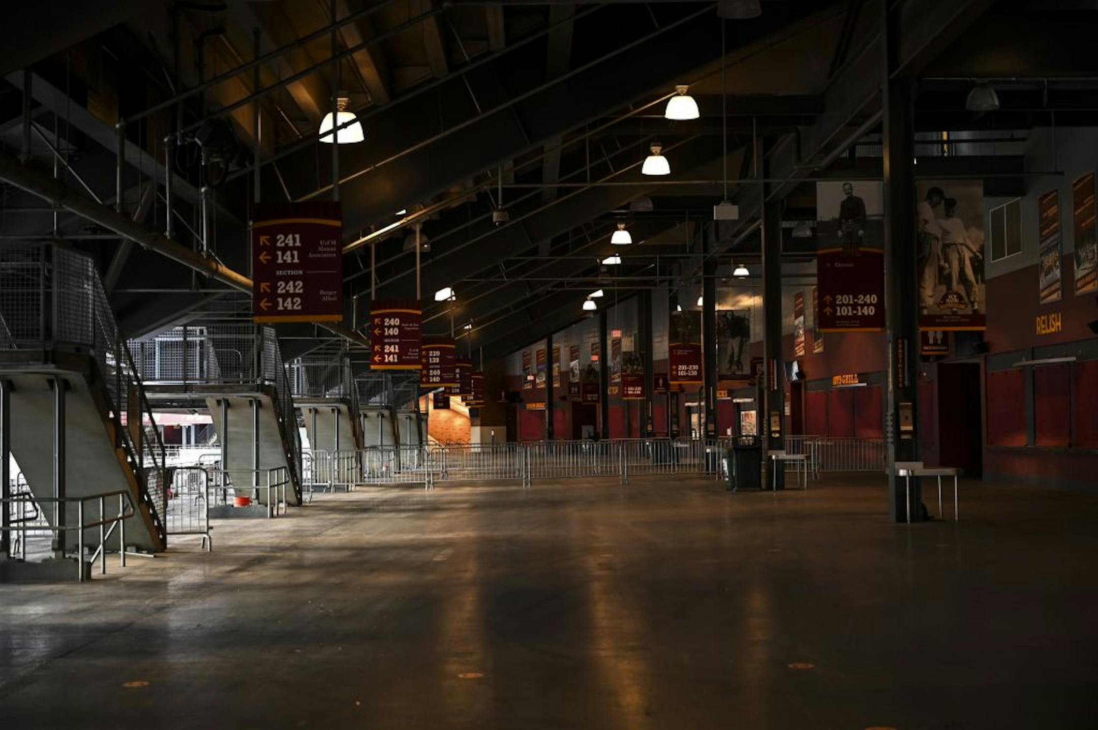 TCF Bank Stadium's concourse was mostly empty before Friday night's game between the Minnesota Gophers and the Iowa Hawkeyes,