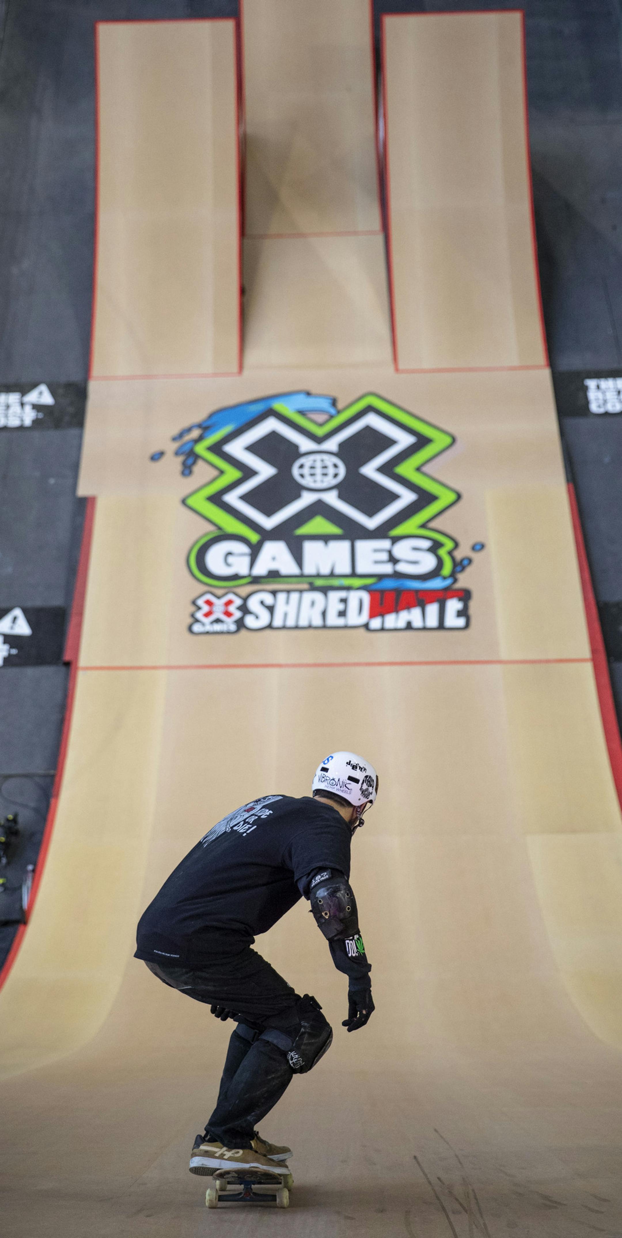 Italo Penarrubia skates down the skateboard big air ramp during a Thursday practice session before the elimination round. ALEX KORMANN • alex.kormann@startribune.com The first day of X Games competition kicked off Thursday August 1, 2019 at U.S. Bank stadium with many of the big air events.