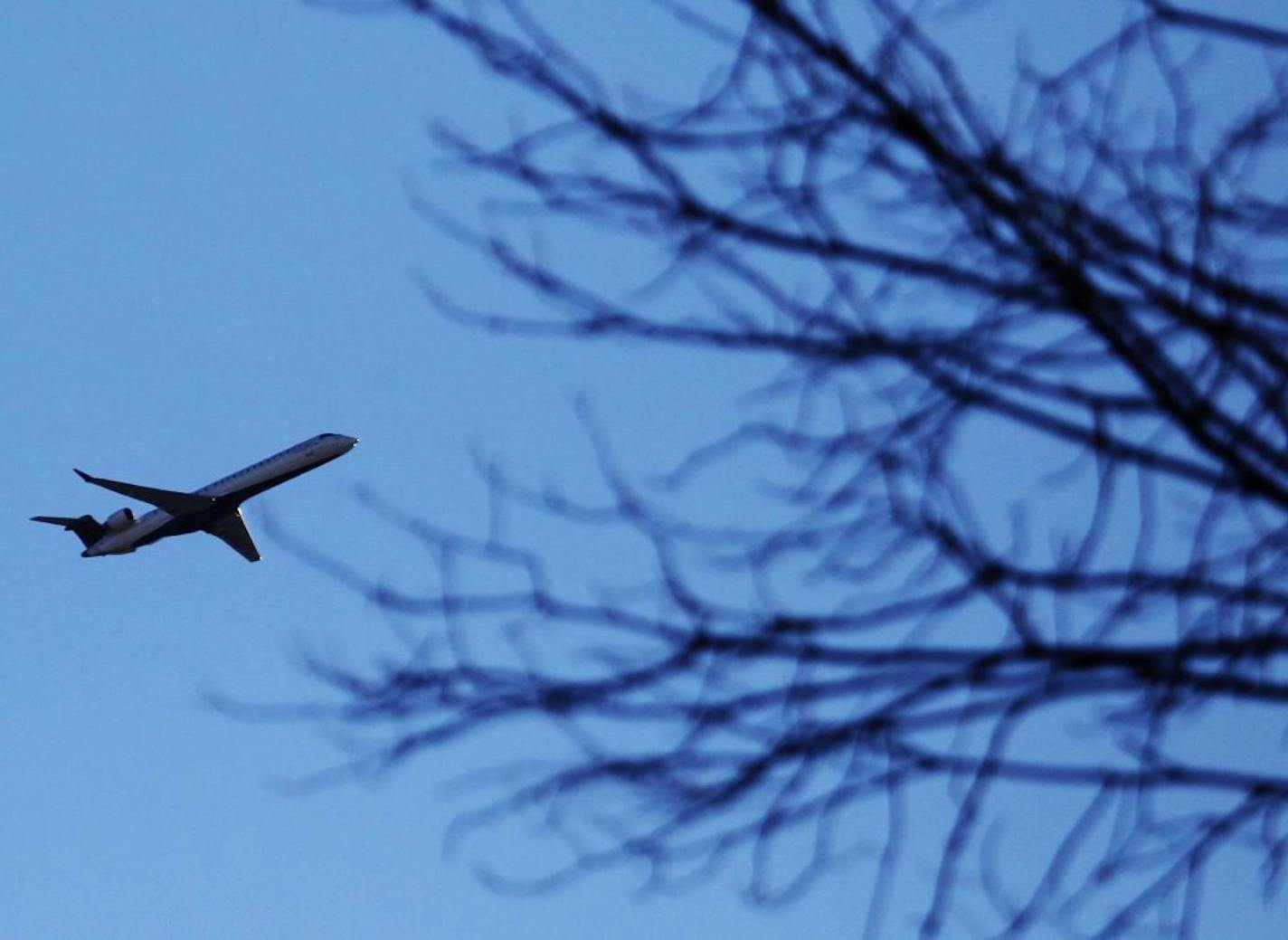 October, 2012: A plane that took off from MSP cruises over a Southwest Minneapolis neighborhood near the Crosstown and Oliver Ave. S.