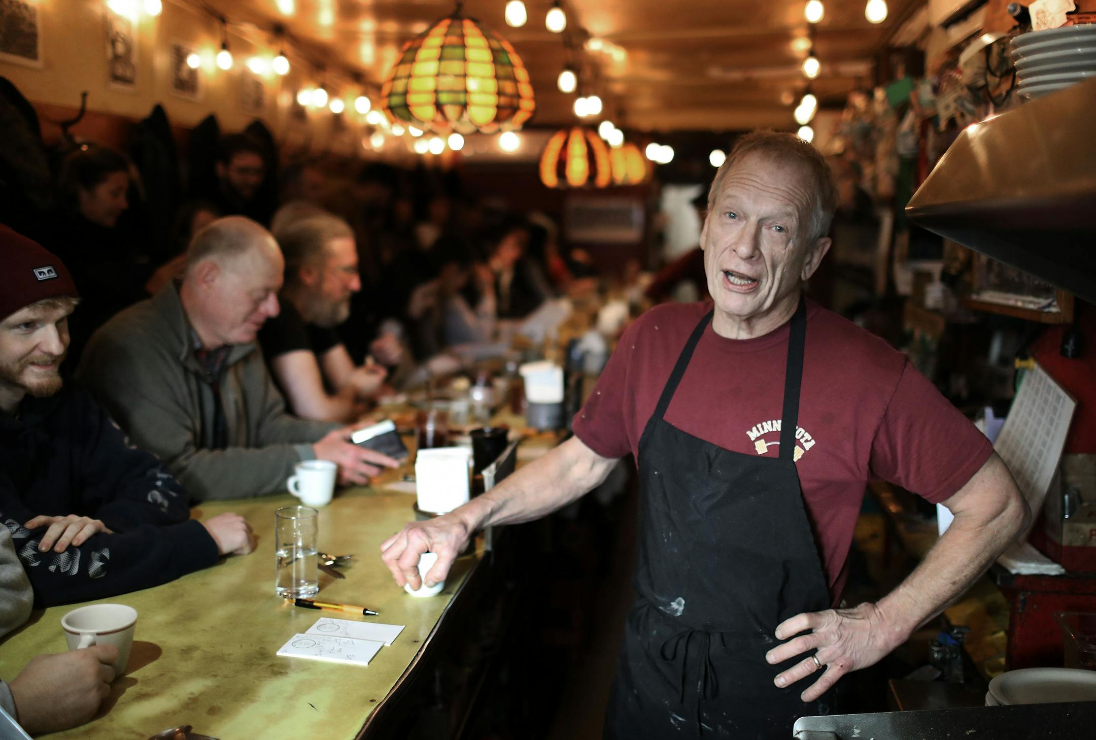 Doug Grina, a staple character at Al's Breakfast for 42 years, works behind the counter on Wednesday, Dec. 18, 2019.