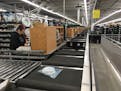A conveyor belt snakes its way more than 2.6 miles through Digi-Key's warehouse in Thief River Falls, shown here in February 2018. (Star Tribune photo