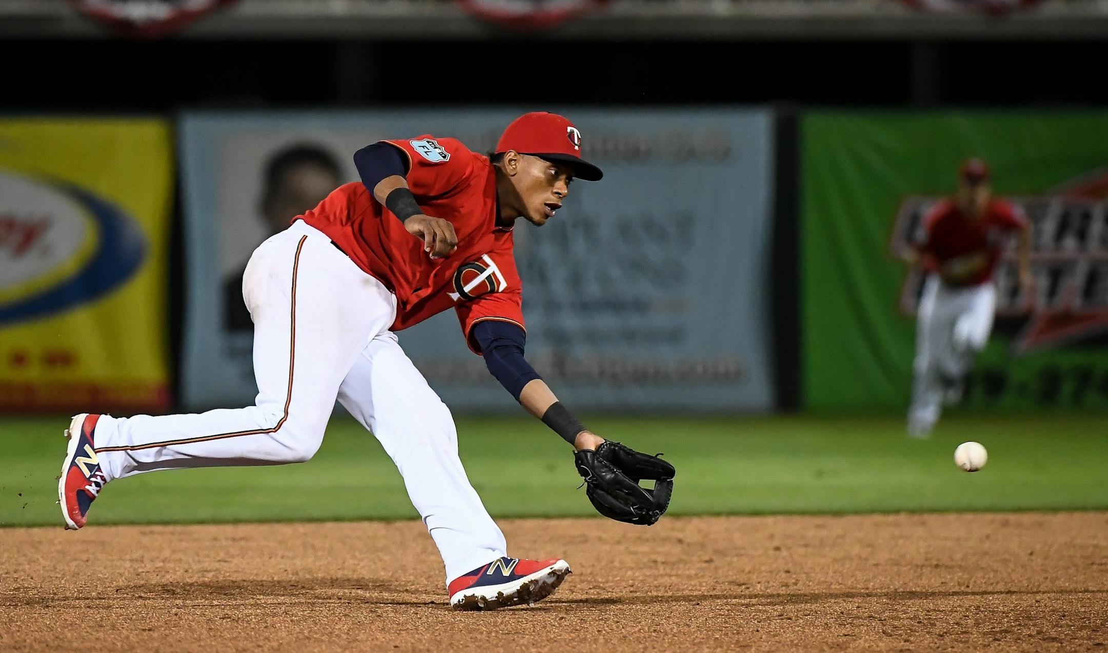 Minnesota Twins shortstop Jorge Polanco (11) scoops up a grounder hit by Rays left fielder Corey Dickerson in the top of the fifth inning.