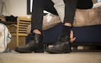 Experts say wearing shoes in the house can damage your floors and track in dirt and toxins. (Dreamstime/TNS)