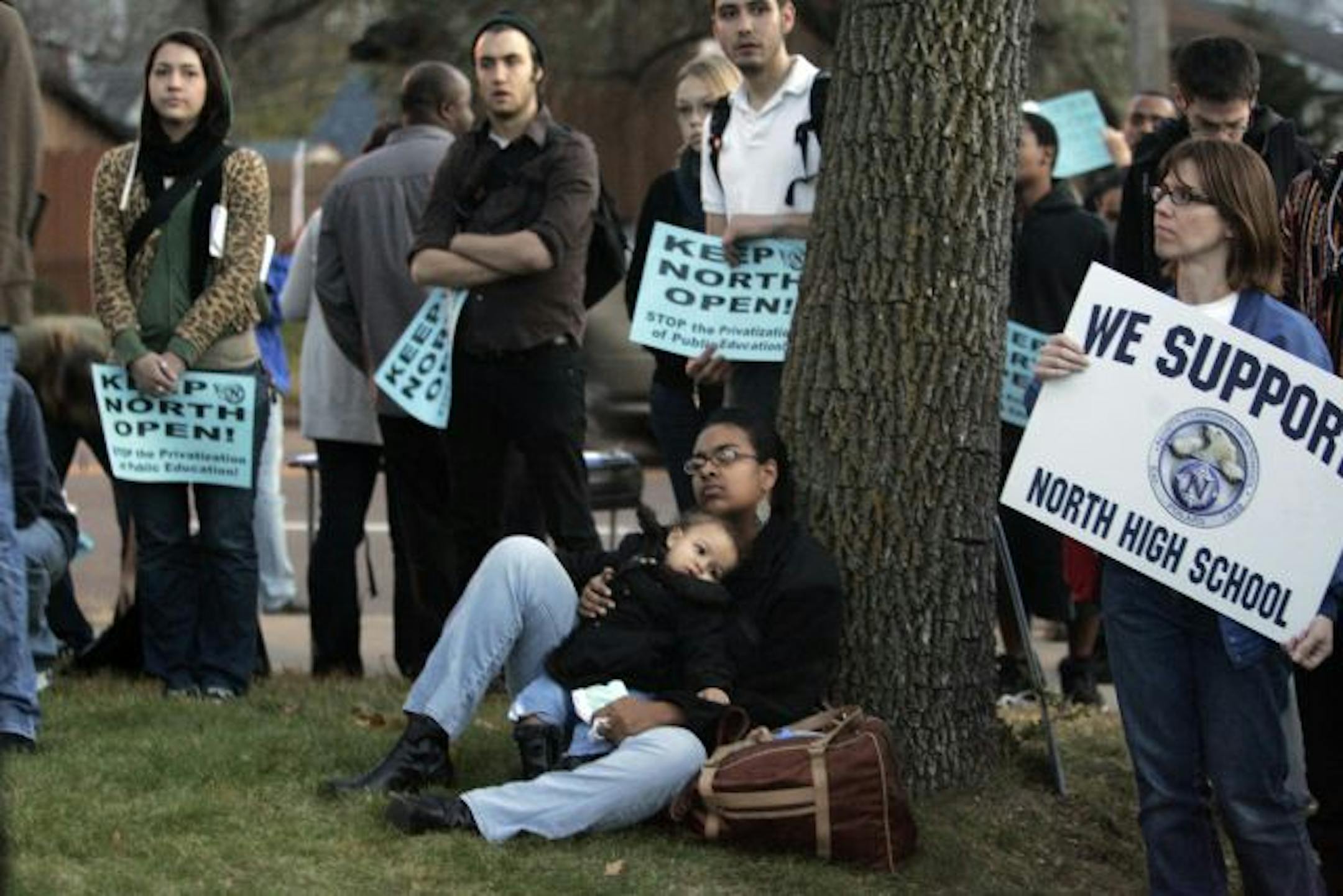 Supporters of North High School listened to speakers during a rally in Minneapolis prior to the school board's vote on the future of the school.