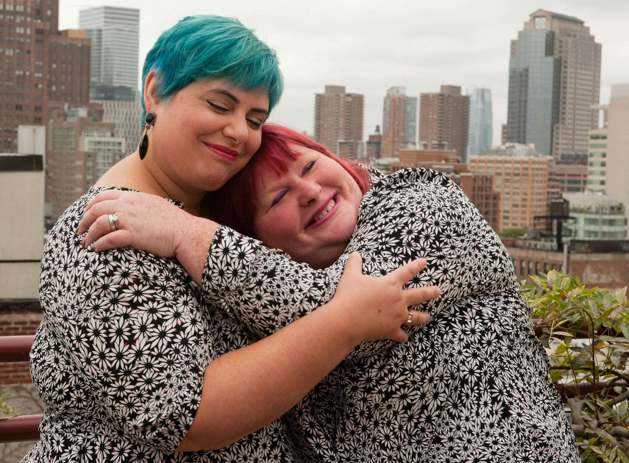 Co-Authors Cassandra Clare (red hair) and Holly Black (blue hair) discuss their new young adult book The Iron Trial, the first in a series, at the Scholastic offices in NYC. ] Kelly Guenther, Special to the Star Tribune, New York, September 2014