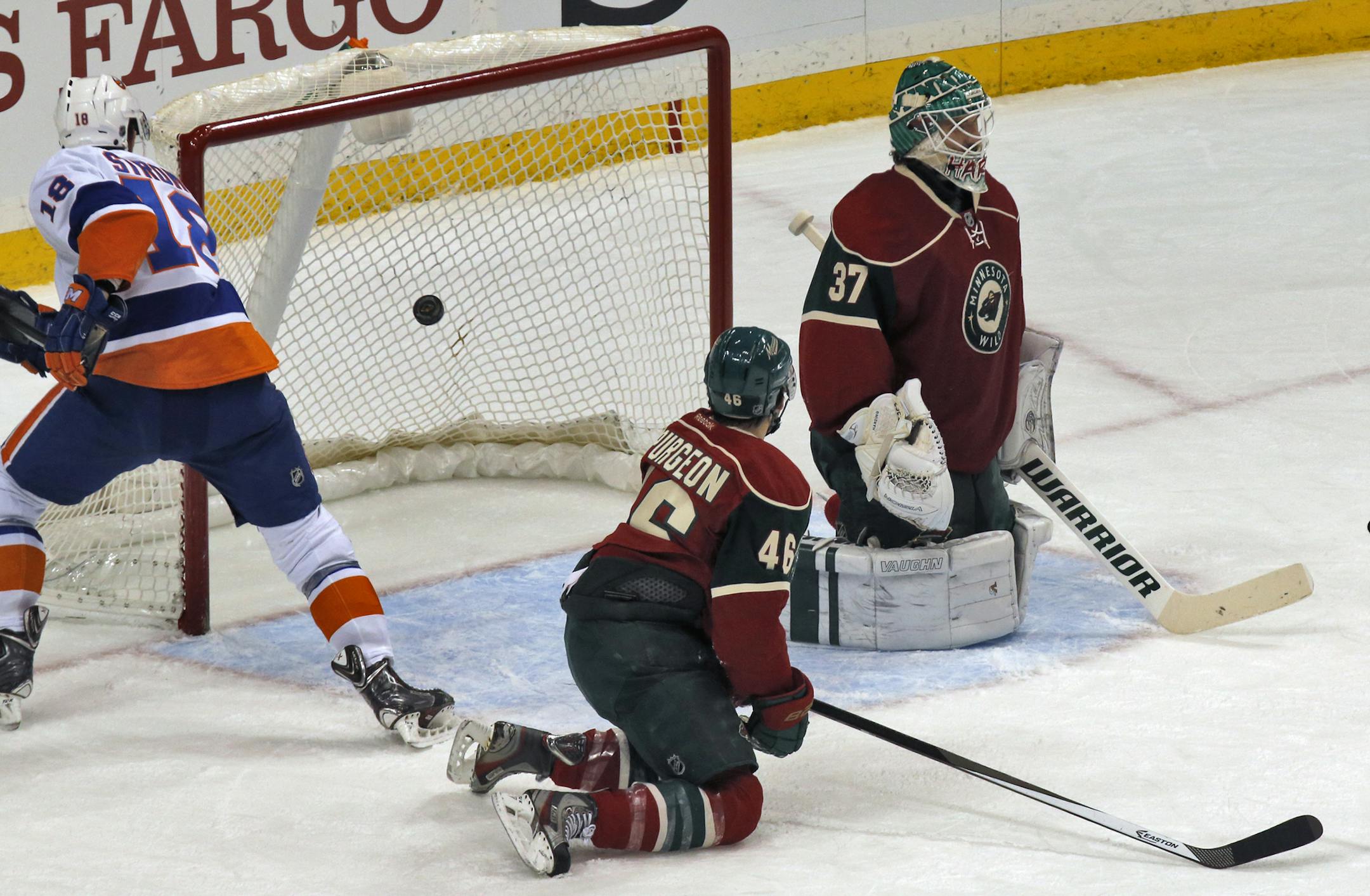 Jared Spurgeon and Wild goalie Josh Harding watched a Cal Clutterbuck shot find the net Sunday night in the Wild’s fifth loss in a row.
