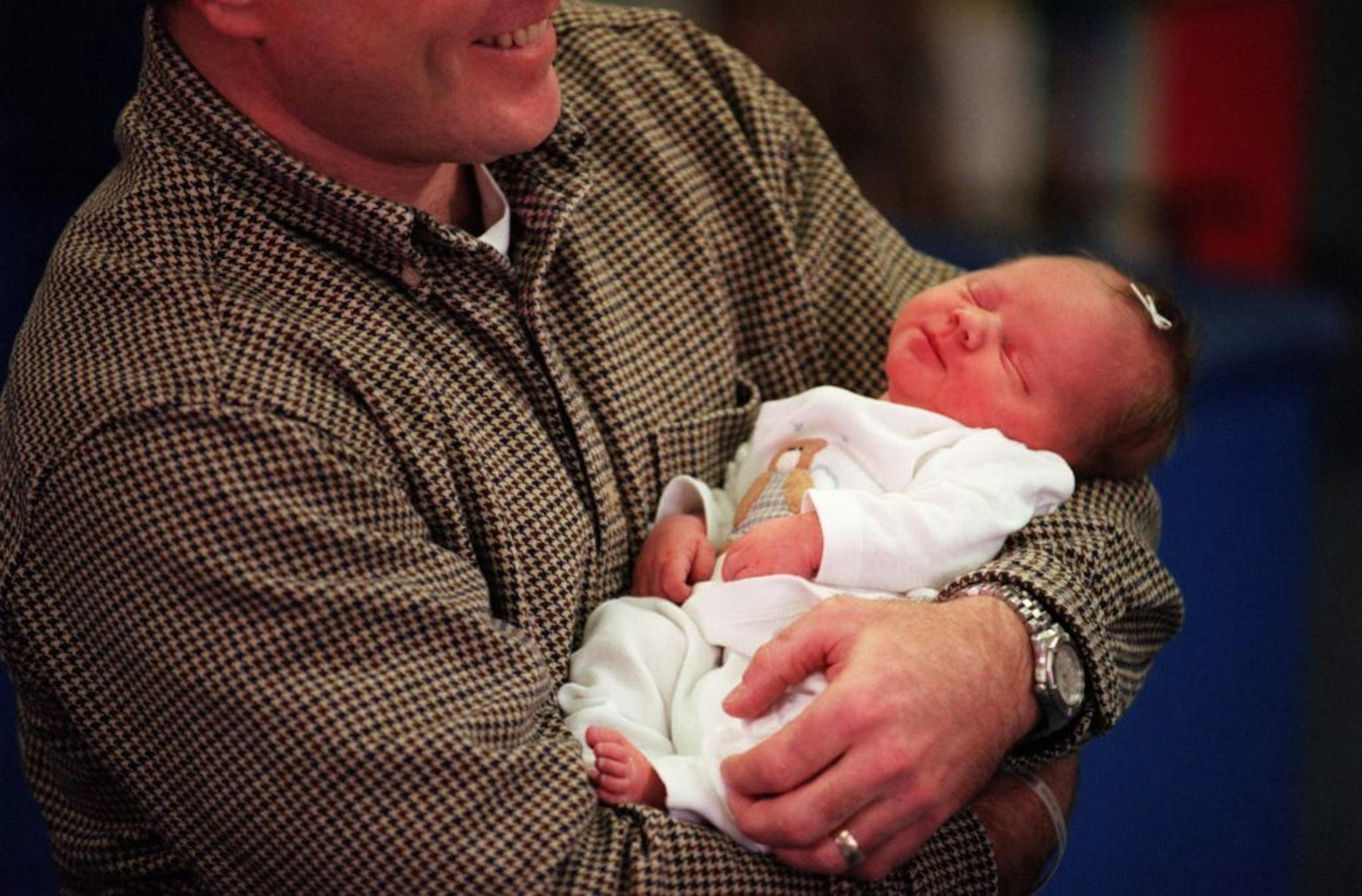 Caroline Katherine (last name witheld) was born at 12:02 am on 1/1/2000 -- the first baby of the year in the Twin Cities. She weighed 7 lbs 4 0z and measured 20.5 inches at birth. She was held in the proud arms of her father at North Memorial Medical Center in Robbinsdale, MN on 1/1/2000.