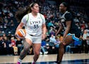 Lynx rookie Alissa Pili (35) catches the ball during a preseason game against the Sky at Target Center on Friday. The game was not televised by the WN