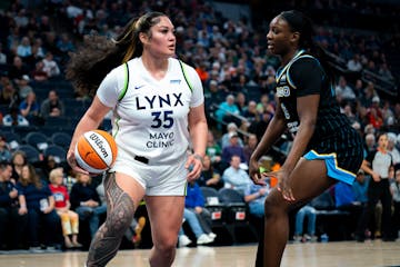 Lynx rookie Alissa Pili (35) catches the ball during a preseason game against the Sky at Target Center on Friday. The game was not televised by the WN