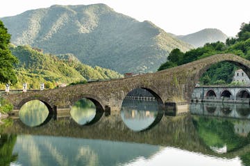 Devils Bridge-Ponte della Maddalena is a bridge crossing the Serchio river near the town of Borgo a Mozzano in the Italian province of Lucca