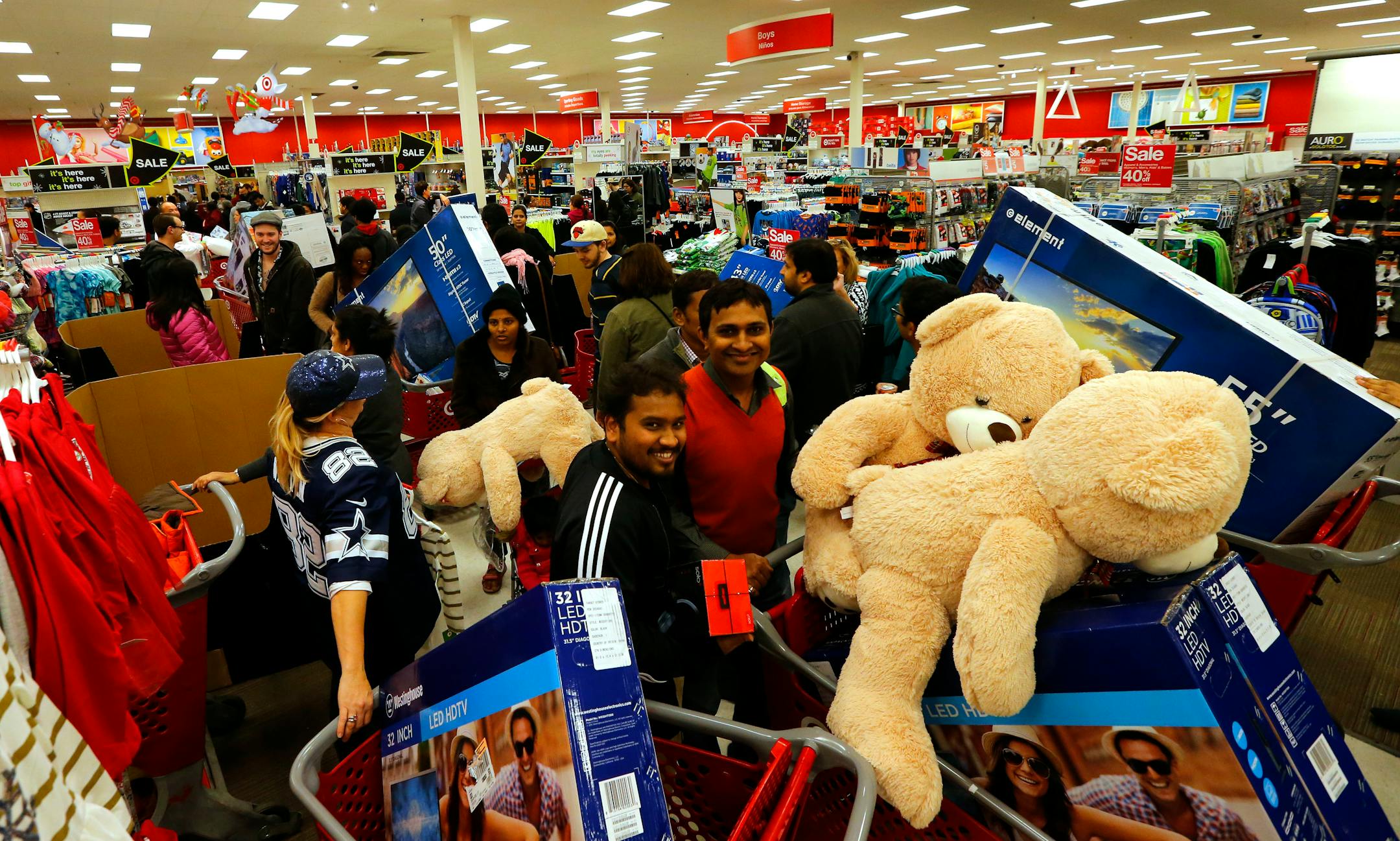 IMAGE DISTRIBUTED FOR TARGET - Guests take advantage of Target's Black Friday sales at the Jersey City, N.J. store Thursday, Nov. 26, 2015. (Noah K. Murray/ AP Images for Target)