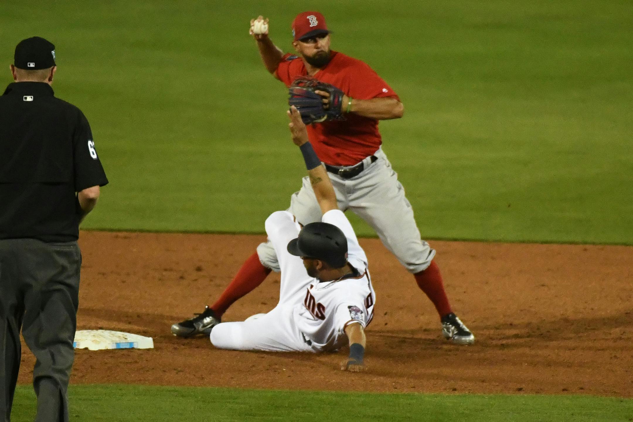 Twins outfielder Eddie Rosario (20) was out at second in the second inning.
