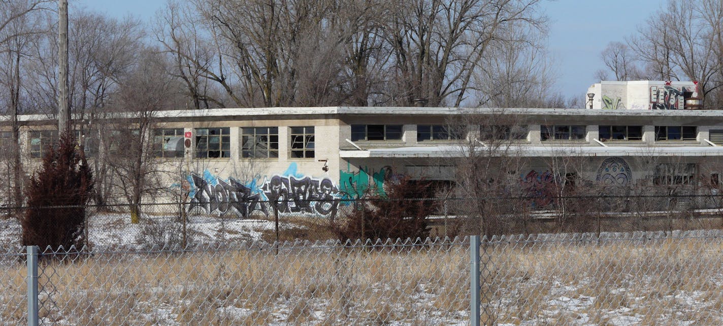 Taggers have gotten to one of the few remaining buildings on the TCAAP site, which may become a welcome center that tells the story of the area's history.