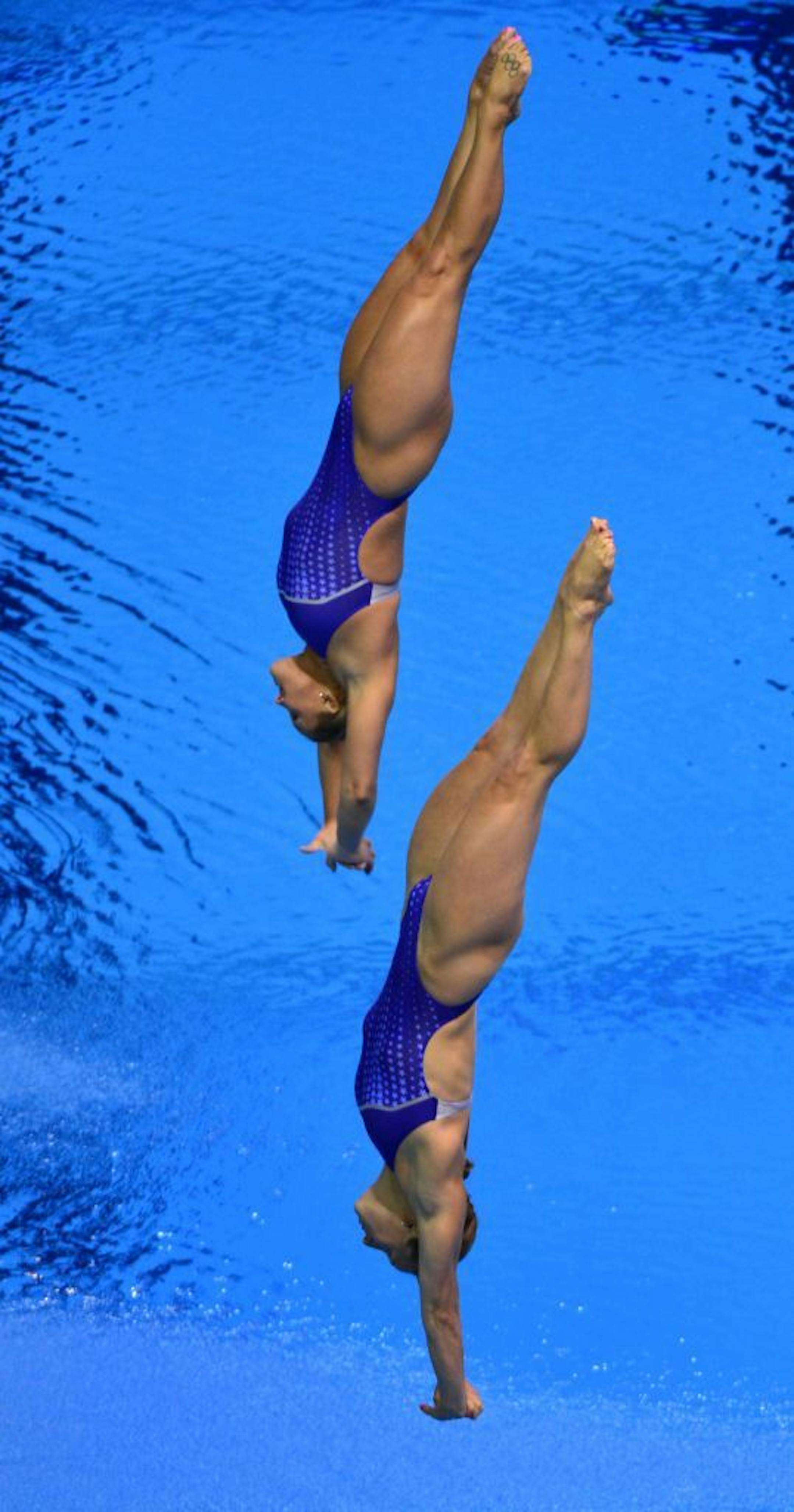 Kelci Bryant (top) and her partner Abigail Johnston took the silver mdeal in the Women's Synchronized 3 meter Springboard.
