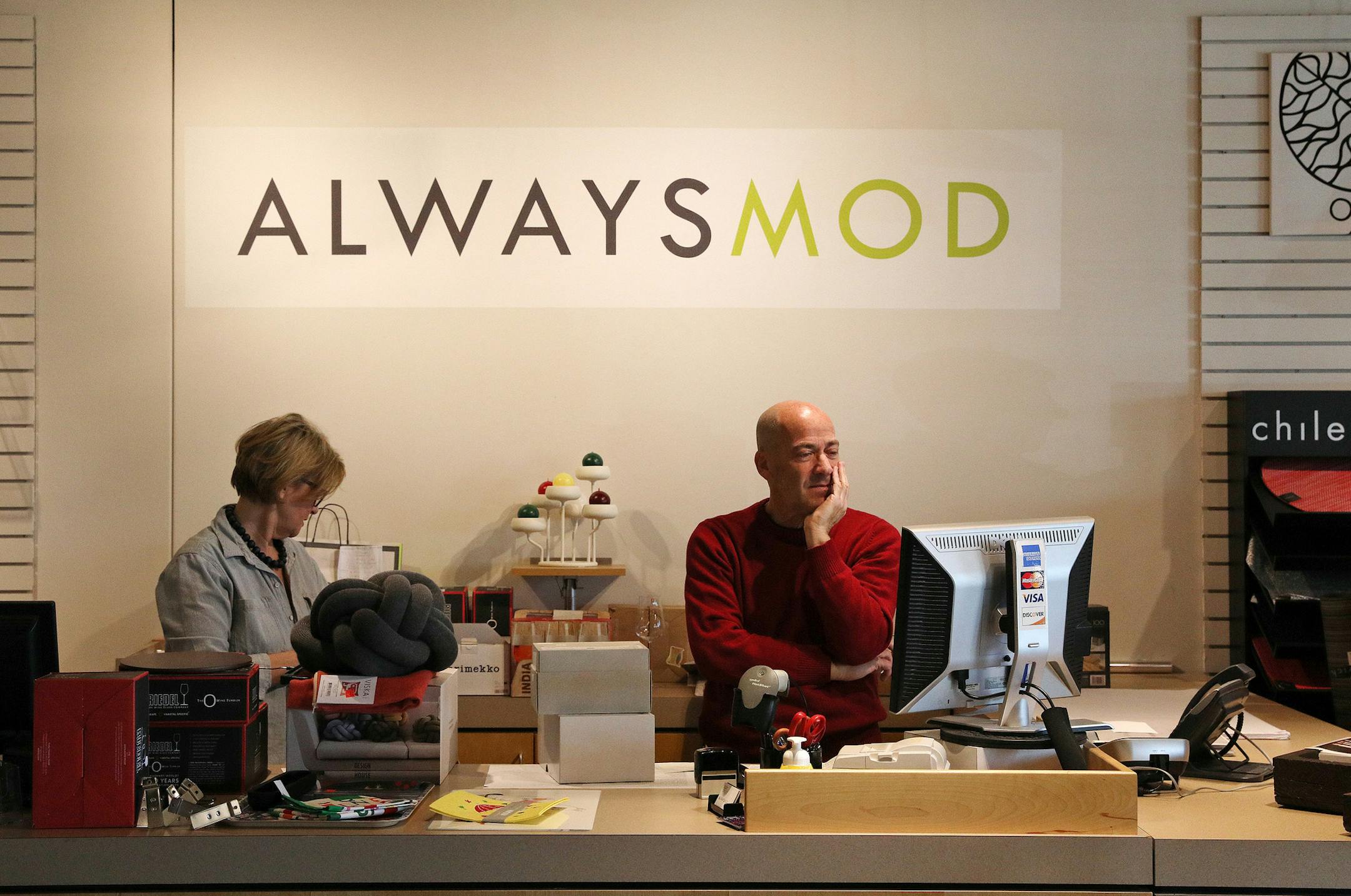 Owner Ben Horn worked on a computer as store associate Bee Reiter took stock of the remaining inventory. ] ANTHONY SOUFFLE ï anthony.souffle@startribune.com Workers took stock of inventory and marked discounts on items Tuesday, March 21, 2017 at Always Mod in Golden Valley, Minn. Ben Horn, owner of Always Mod, formerly Finn Style, has decided to close his retail shop and go exclusively into online sales for his Scandinavian home decor.