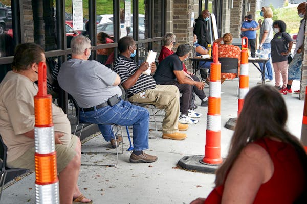 Job seekers waited to be called into the Heartland Workforce Solutions office in Omaha in July.