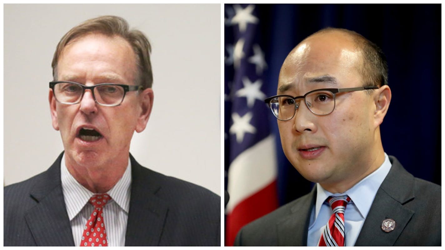 Washington County Attorney Pete Orput and Ramsey County Attorney John Choi.