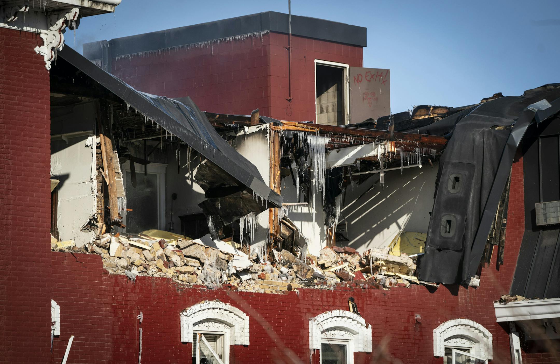 A detail of the most obvious damage in fire that started on Thursday that heavily damaged the Archer House building in downtown in Northfield, Minn. Photographed on Friday, November 13, 2020. It continued to burn Friday morning and the 143-year-old building was judged likely a total loss. ] RENEE JONES SCHNEIDER renee.jones@startribune.com