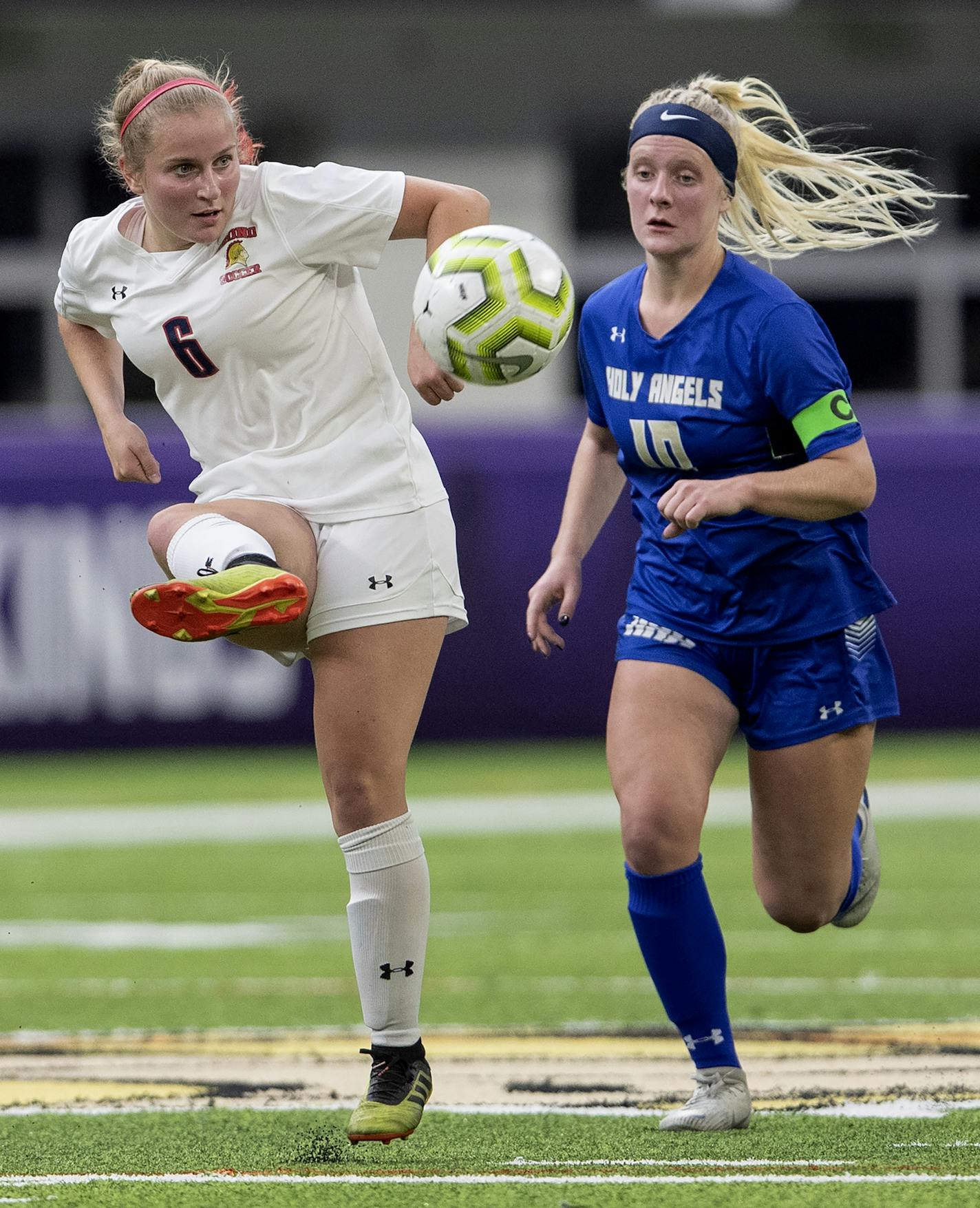 Gabby Hyrkas (6) of Orono and Mia Van der Heide (10) of Holy Angels fought for the ball in the first half on Monday. Orono takes on defending Class 1A champion Mahtomedi in the first of four title matches on Thursday at U.S. Bank Stadium. Photo: CARLOS GONZALEZ • cgonzalez@startribune.com