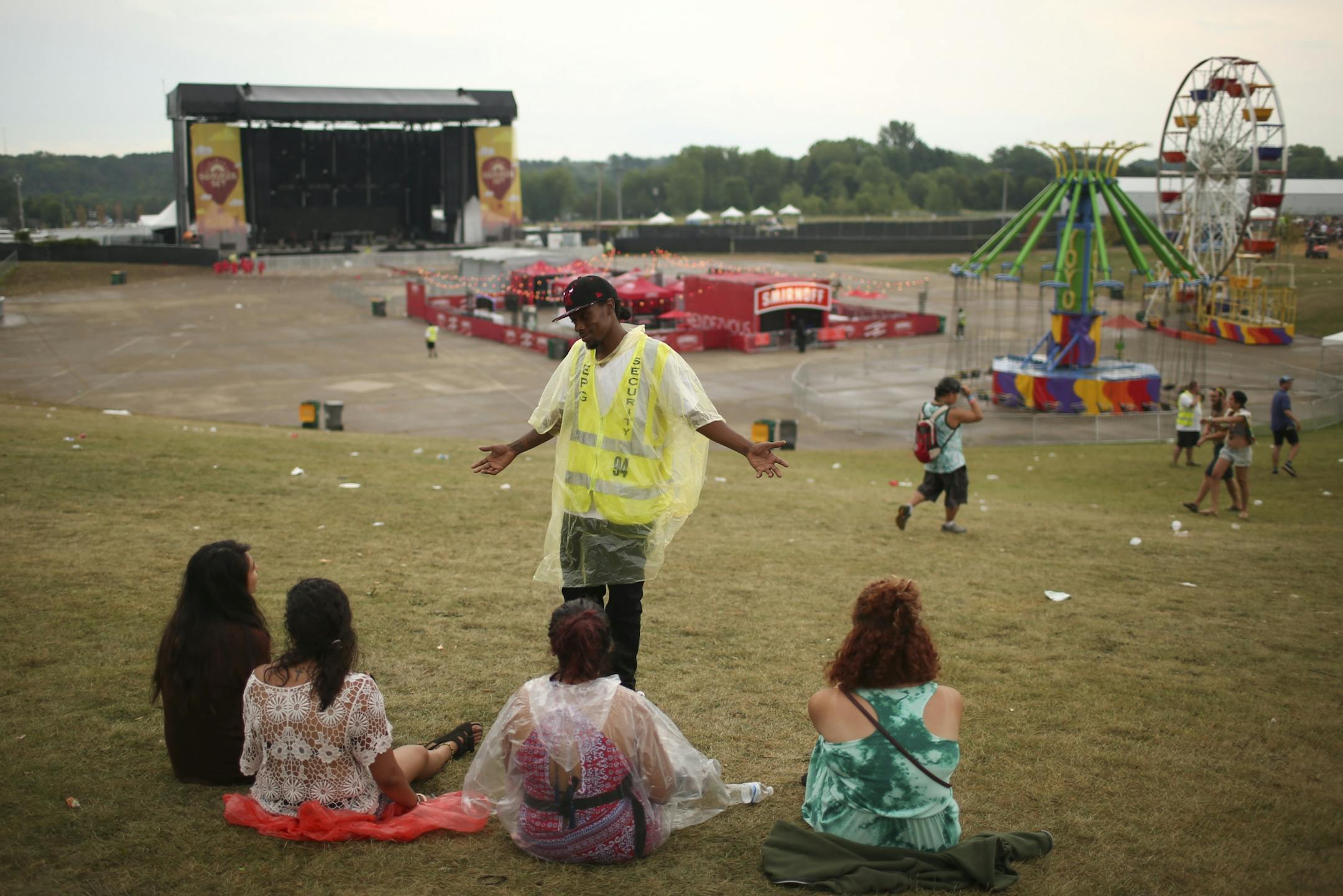 A security guard implored music lovers to return to their cars to sit out the weather heading for Summer Set Sunday evening.