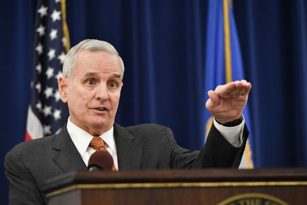 Governor Mark Dayton answered questions about the minimum wage and other subjects after the turkey event.