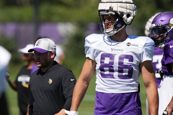 Minnesota Vikings tight end Johnny Mundt (86) watches a drill during training camp Wednesday, Aug. 3, 2022 at the TCO Performance Center in Eagan, Min