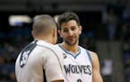 Minnesota Timberwolves guard Ricky Rubio, right, of Spain, pleads with referee Steve Anderson (35) during the first half of an NBA basketball game aga