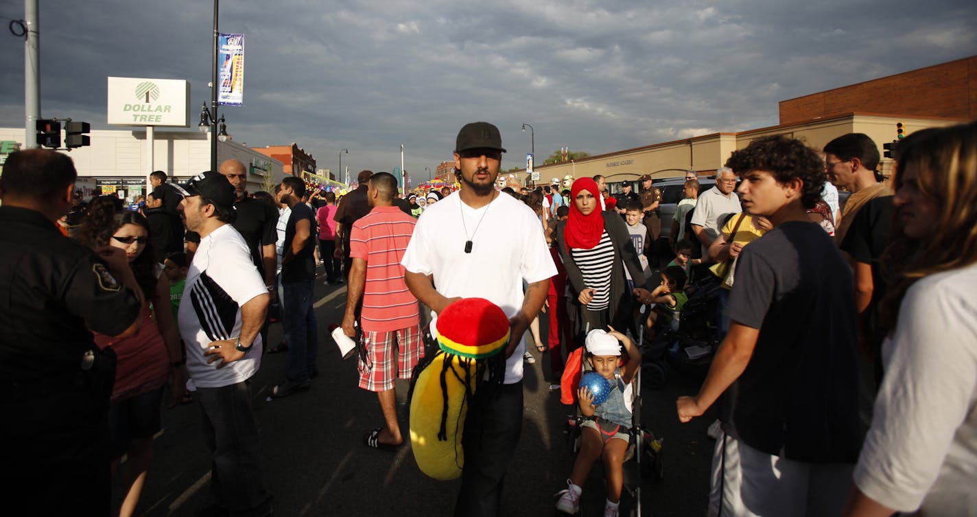 Ehsan Al-Nassiri and his family attended the Arab International Festival on June 17. Al-Nassiri, 27, was born in Iraq but grew up in Dearborn.