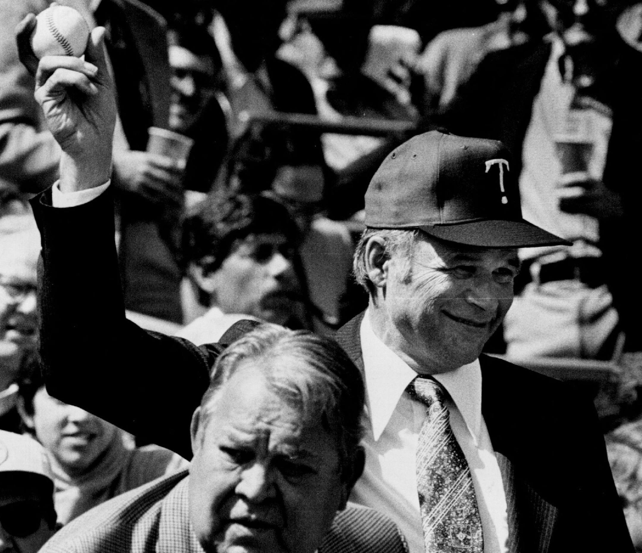 April 18, 1979 While Twins President Calvin Griffith, left, was Probably looking at the large turnout at Metropolitan Stadium, Gov. Al Quie tossed out the ball to open the Twins' 1979 home season. A record opening-day crowed of 37,270 fans watched the Twins lose 6-0 to the California Angels. April 17, 1979 Stormi Greener, Minneapolis Star Tribune ORG XMIT: MIN2015041217534030