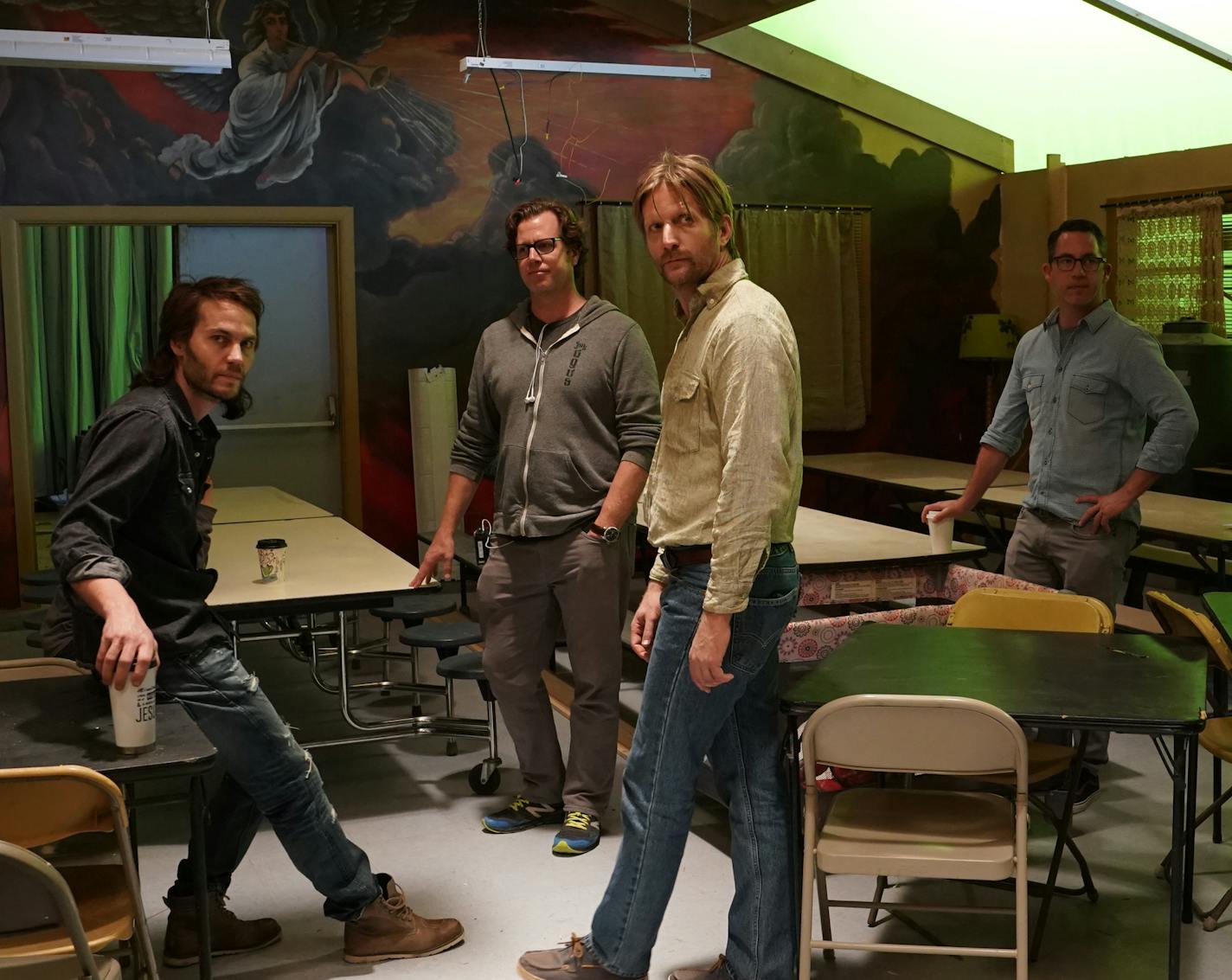 Behind the scenes during filming of the Paramount Network 6-part TV event "Waco," which premieres on Wednesday, January 24 at 10 pm ET/PT.
From left to right: Taylor Kitsch stars as David Koresh, director John Erick Dowdle, Paul Sparks as Steve Schnider and director Drew Dowdle. Photo by Ursula Coyote