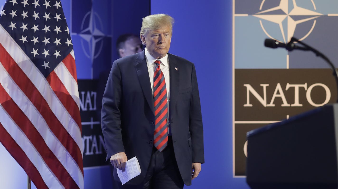 U.S. President Donald Trump addresses a news conference after a summit of heads of state and government at NATO headquarters in Brussels on Wednesday, July 11, 2018. (AP Photo/Markus Schreiber)