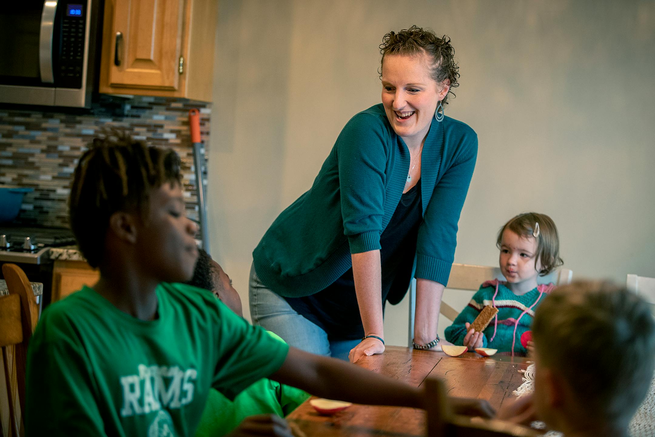 Kate Lundquist fed her children a snack as they took a break from school, Tuesday, September 29, 2020 in Brooklyn Park, MN.
