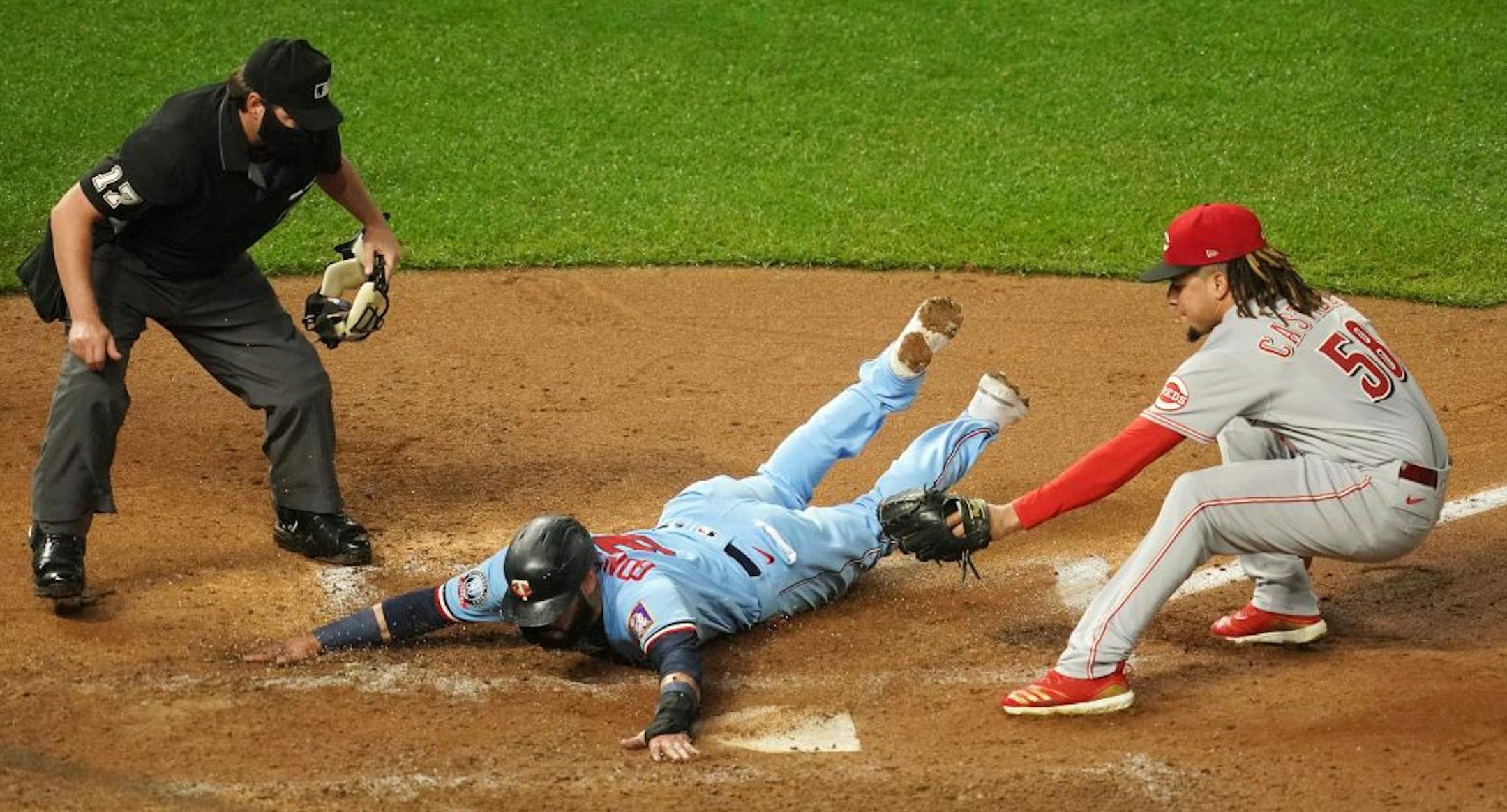 Minnesota Twins first baseman Marwin Gonzalez (9) scored on a wild pitch by Cincinnati Reds starting pitcher Luis Castillo (58) who was unable to make the tag at home in the fourth inning.