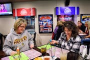 Lisa Paal and Debbie Dodge, friends and sisters-in-law, played bingo at Sticks and Stones Sports Bar in Blaine.