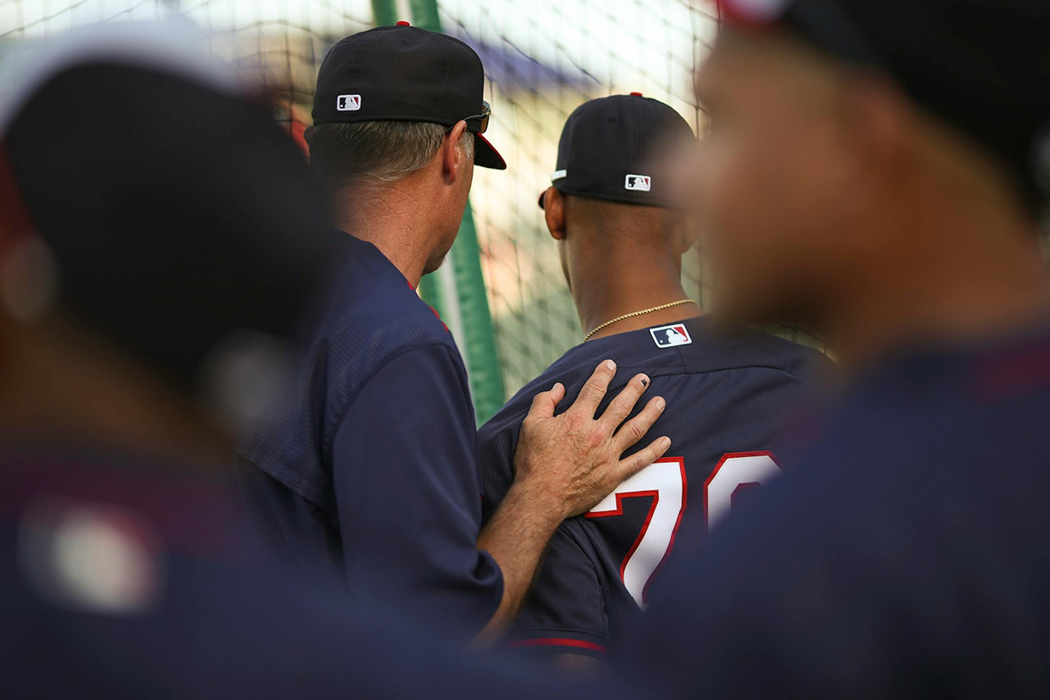 Twins hitting coach Tom Brunansky talked with Minnesota Twins center fielder Byron Buxton (70) between his sessions taking batting practice before Thursday night's game against the Red Sox at Hammond Stadium.