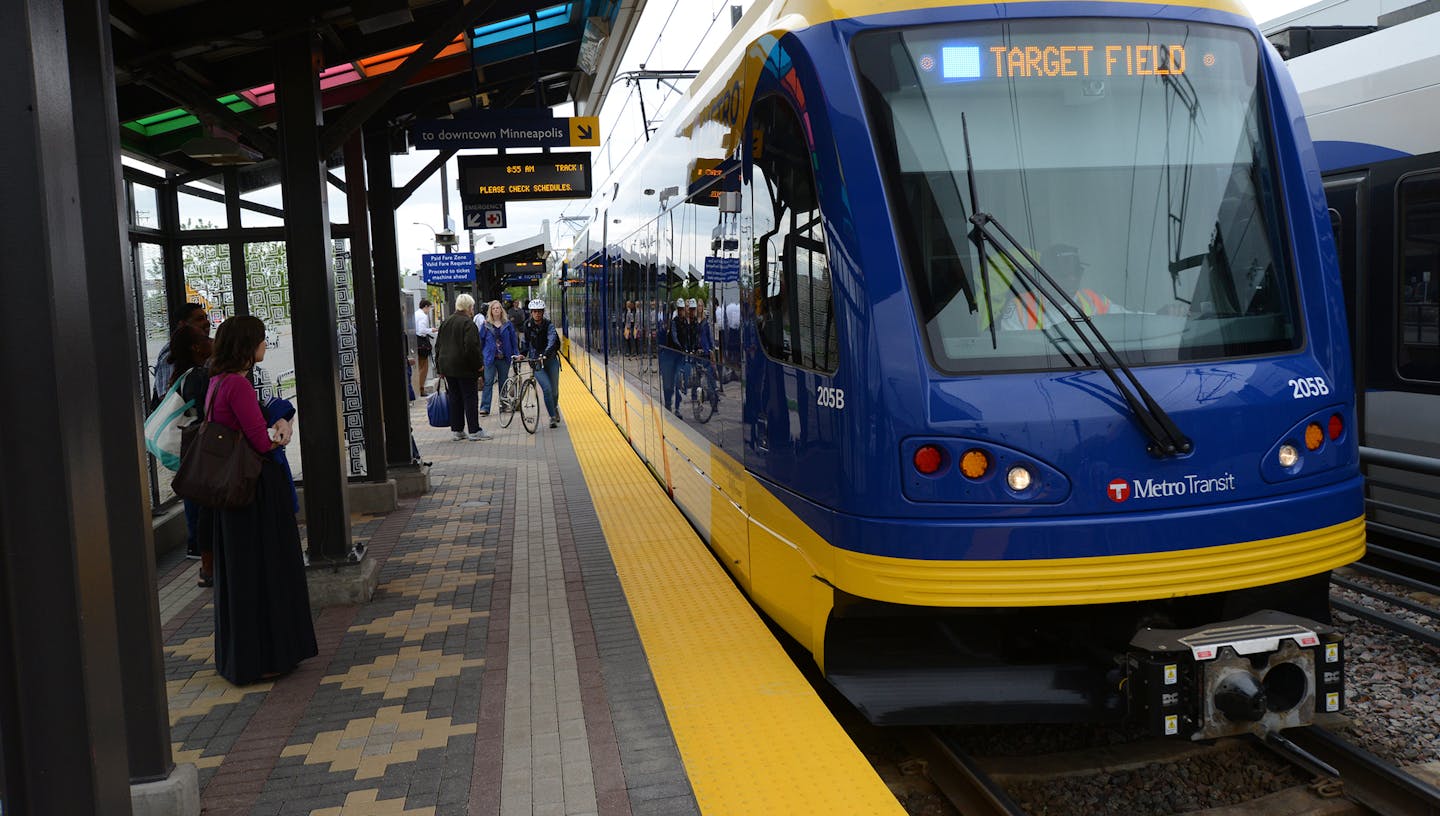 The Hiawatha Light Rail Line is being rebranded as the METRO Blue Line. The Blue Line is the first of the Twin Cities METRO system of rapid transit lines which include METRO Red Line Bus Rapid Transit on Cedar Ave. METRO Blue Line trains will now have three cars and will run every ten minutes throughout most of the day. Twelve new light-rail vehicles dedicated to the line will allow this increased service capacity. During the kickoff event Metro Transit staff handed out Blue line pens, new sched