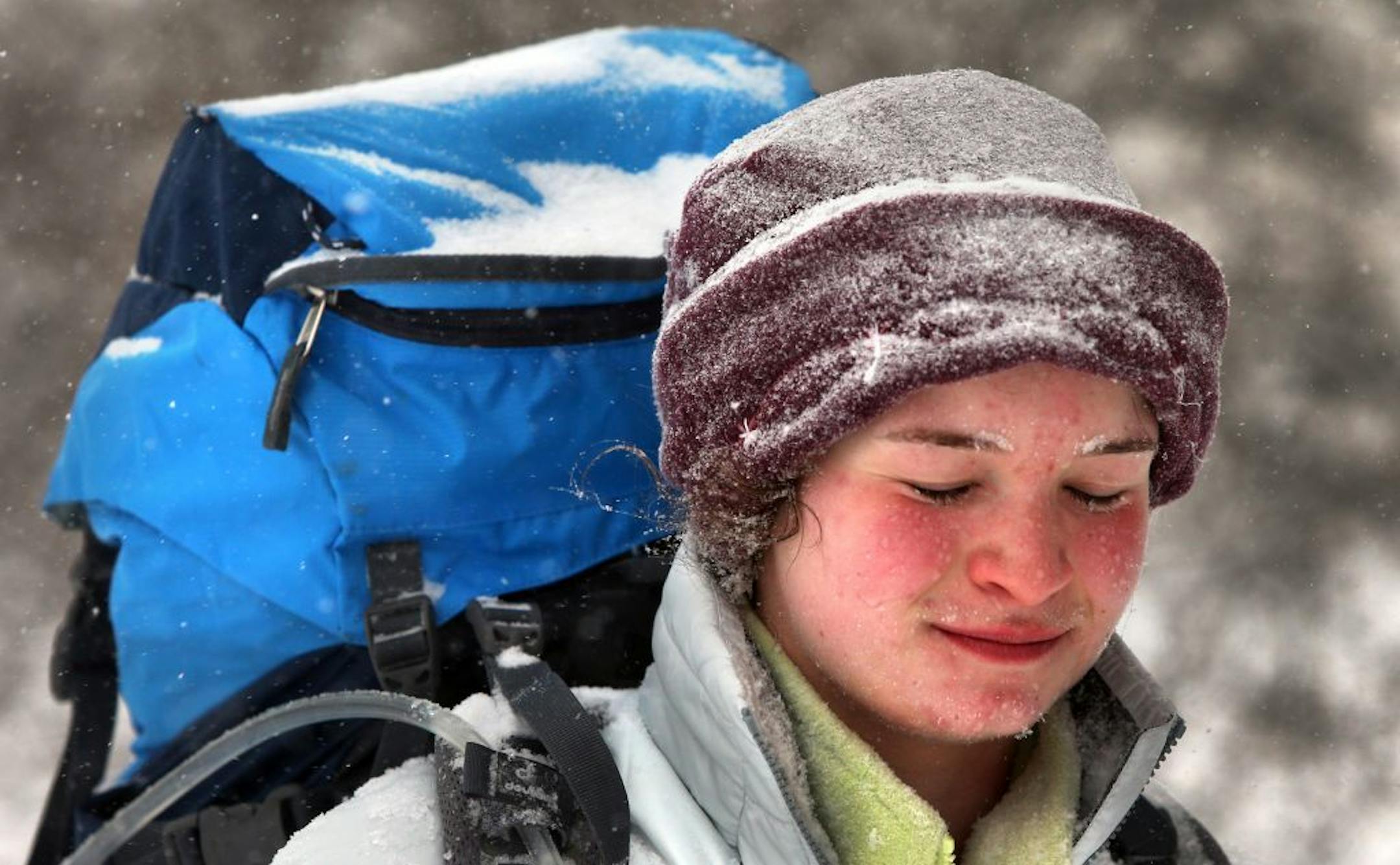 Rebecca Gee heads for home as she trains for a backpacking trip to Arizona while walking down Selma Avenue in Webster Groves, Missouri, on Sunday, Jan. 5, 2014.