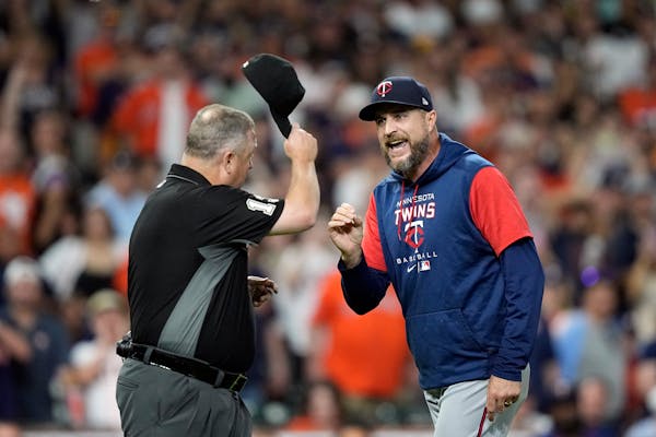 Minnesota Twins manager Rocco Baldelli argues with umpire Todd Tichenor during the fifth inning of a baseball game against the Houston Astros Tuesday,