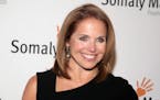 FILE - This Oct. 23, 2013 file photo shows TV host Katie Couric at the Somaly Mam Foundation Gala in New York. Couric is joining Yahoo to anchor a new