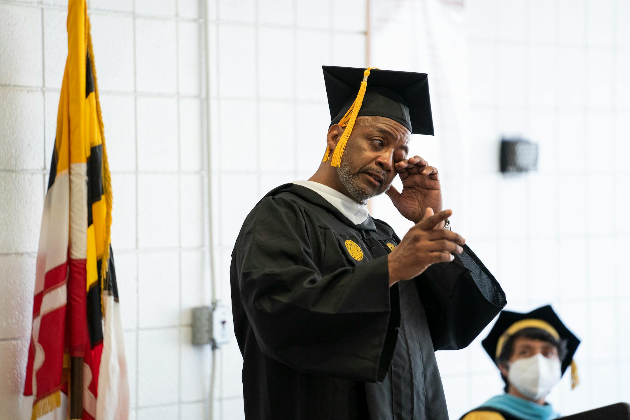JJames Jackson wipes away a tear as he speaks during the Goucher College graduation ceremony at the Maryland Correctional Institution-Jessup. MUST CREDIT: Washington Post photo by Carolyn Van Houten.