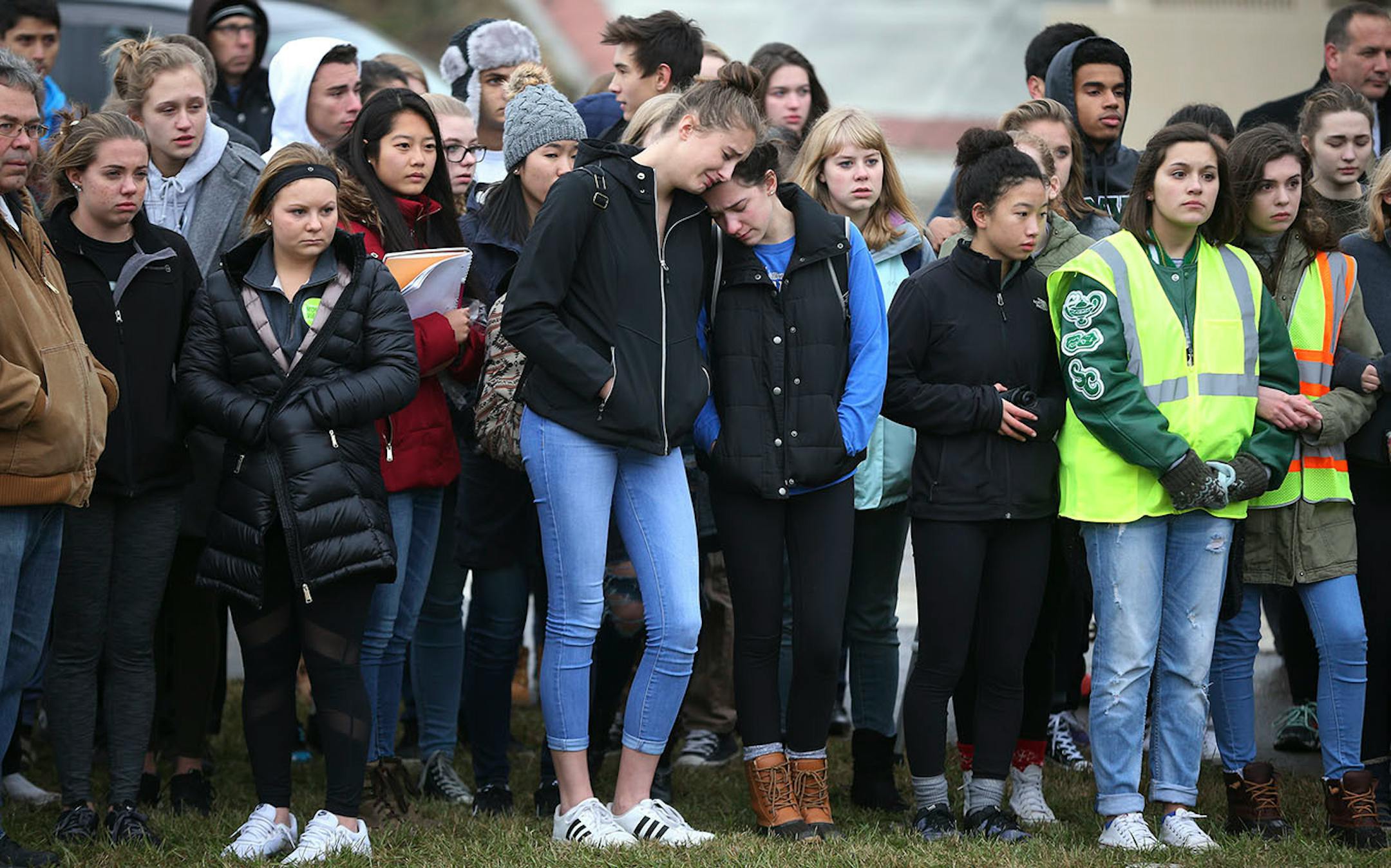Students from Mounds View High school gathered at the crash scene along Hwy. 96 where they left memorials for two students who were killed in a crash December 05, 2016.