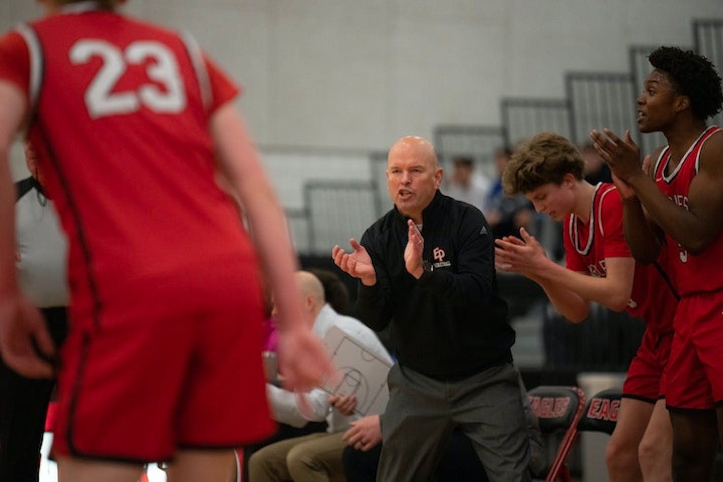 Eden Prairie coach David Flom talked to his team during a first-half timeout. Flom coached his first game Tuesday since he was reinstated after being suspended and investigated for using a racial slur in a teaching situation. (Jeff Wheeler/Star Tribune/TNS) ORG XMIT: 69998904W