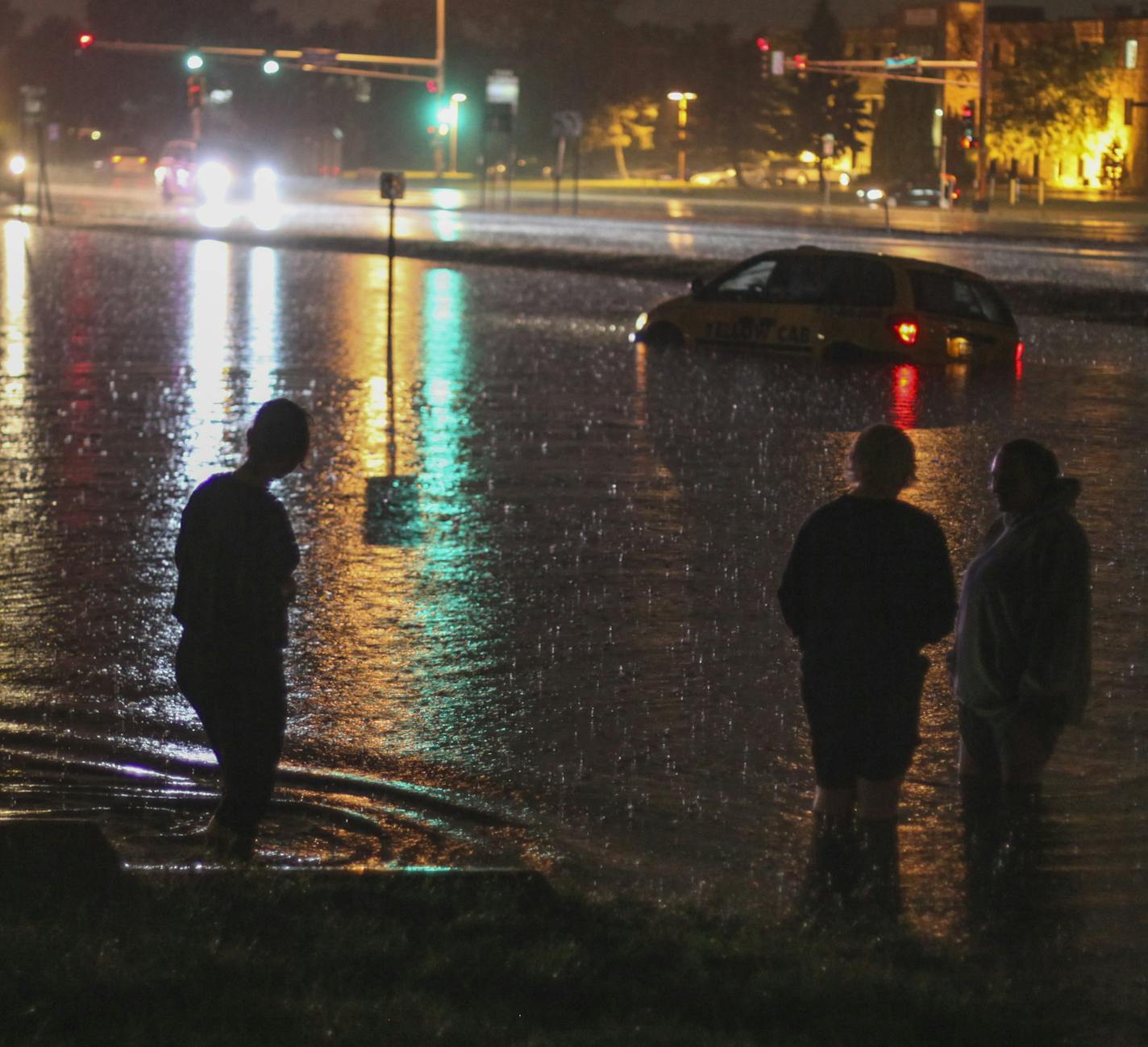 Flash flooding caught a motorist unaware near the intersection of University and 73rd Aves. NE in Fridley. ] Mark Vancleave - mark.vancleave@startribune.com * Heavy rain hammered the northern metro causing flash flooding and damage to buildings Wednesday, Sept. 21, 2016.