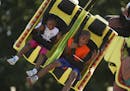 The Minnesota State Fair opened Thursday, August 22, 2013 on a perfect day, weather-wise. Janece Duputie, 6, and her brother Samuel, 12, of Golden Val