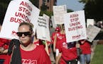 Thousands of nurses walked around Abbott Northwestern on the first day of the strike Sunday June 19, 2016 in Minneapolis, MN.] Day One in the Allina H