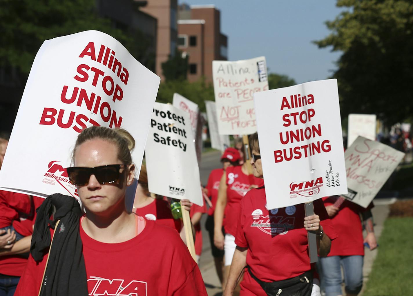 Thousands of nurses walked around Abbott Northwestern on the first day of the strike Sunday June 19, 2016 in Minneapolis, MN.] Day One in the Allina Health nurses strike. Jerry Holt /Jerry.Holt@Startribune.com ORG XMIT: MIN1606191043421724