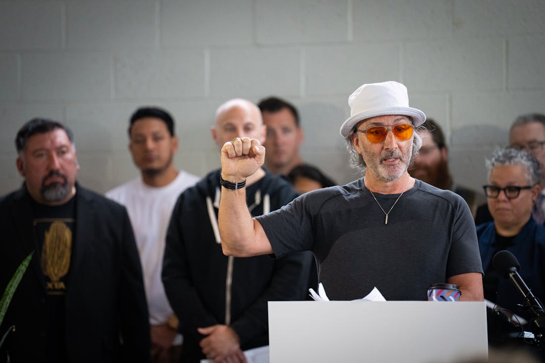 Restaurant owner David Fhima speaks at a press conference inside the Glass House event venue in Minneapolis on Tuesday.





Mayor Jacob Frey and the 