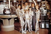 The 1960s TV series Lost in Space featured, from left, pilot Don West (Mark Goddard), mother Maureen Robinson (June Lockhart), father John Robinson (G