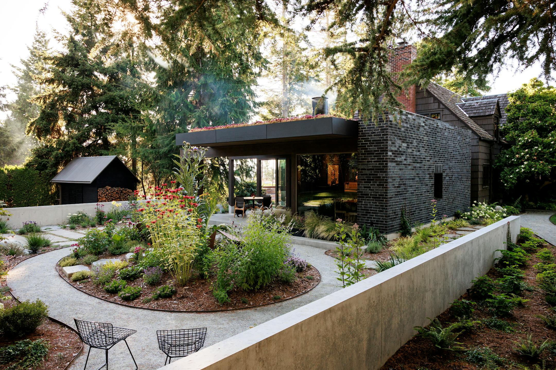 A home built in 1933 and now designated as a historical landmark, on Puget Sound in Seattle's Ballard neighborhood, on Aug. 3. 2023. New owners found a way to marry a contemporary kitchen extension to the Scandinavian vernacular architecture of the house, built by a Norwegian sea captain as a replica of his childhood home. (Brooke Fitts/The New York Times)